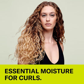 DevaCurl No-Poo Original close-up label highlighting sulfate-free formula and ingredient benefits