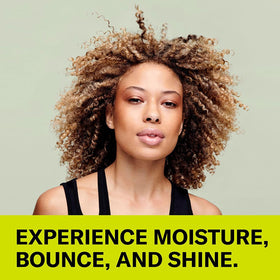 DevaCurl application in hand demonstrating easy distribution and a non-sticky, soft finish