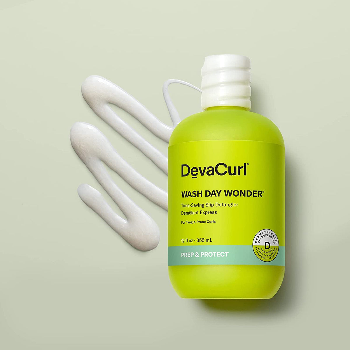 DevaCurl creamy gel texture close-up demonstrating smooth slip for easier combing