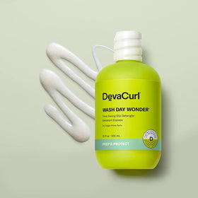 DevaCurl creamy gel texture close-up demonstrating smooth slip for easier combing