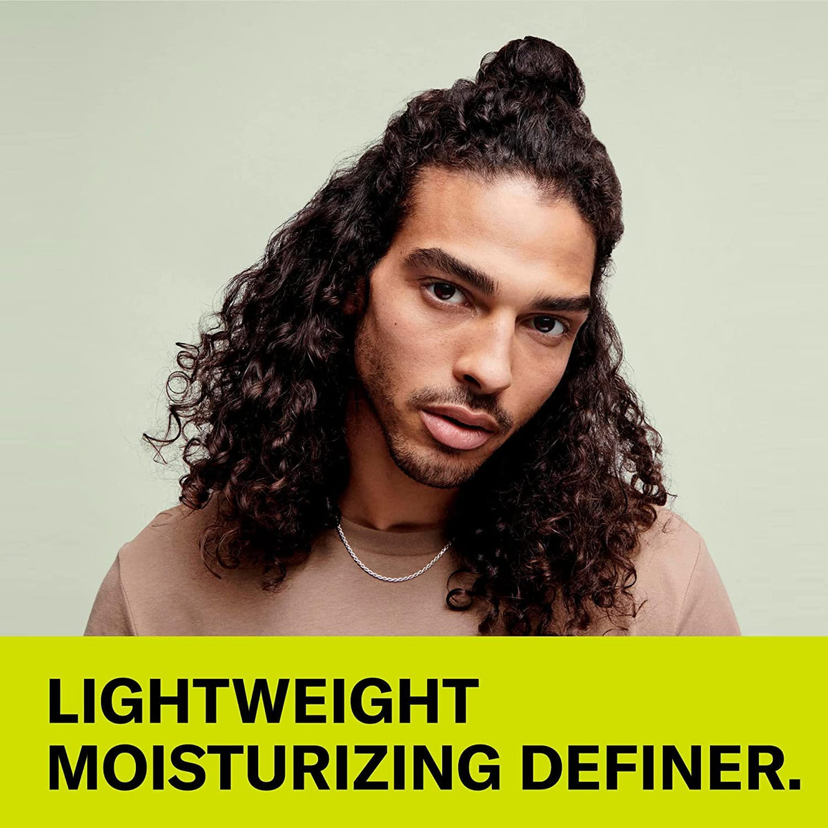 DevaCurl Wave Maker dispensed on hand highlighting easy spreadability and slip