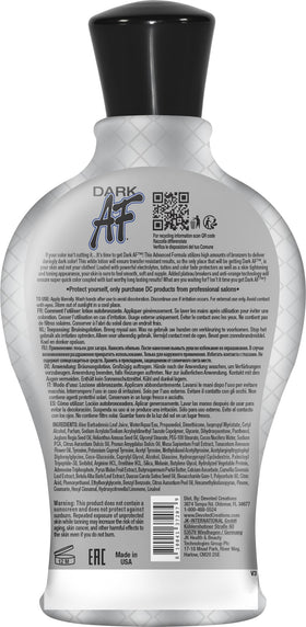 Devoted Creations Dark AF lotion applied to forearm demonstrating smooth absorption and tone