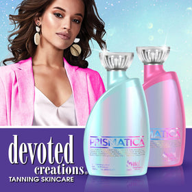 Devoted Creations Prismatica bottle next to hand showing 400ml size and real-world scale