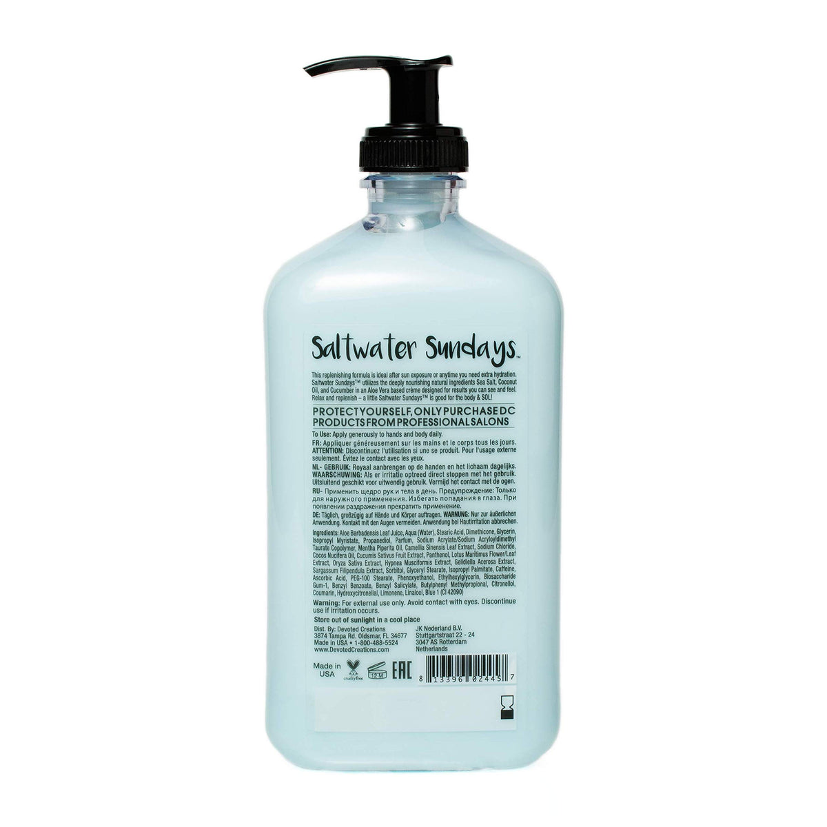 Devoted Creations moisturizer on hand close‑up with smooth texture, showing cooling peppermint benefit