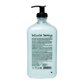 Devoted Creations moisturizer on hand close‑up with smooth texture, showing cooling peppermint benefit