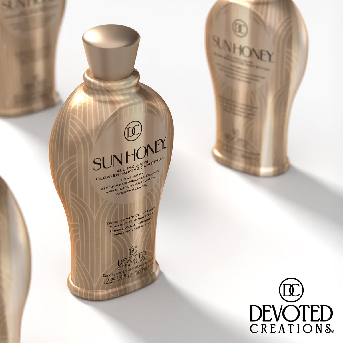 Devoted Creations bottle in hand demonstrating size and travel-friendly benefit