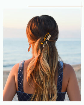 DF DUALFERV barrette worn in half-up hairstyle offering comfortable, elegant hold