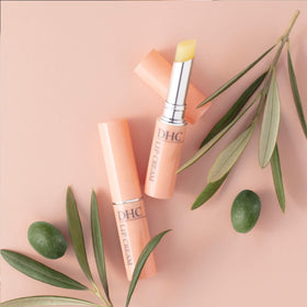 DHC Lip Cream closeup ingredients label highlighting botanicals and benefits