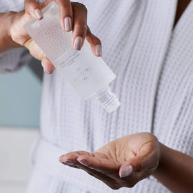 DHC Mild Lotion cap and label detail highlighting alcohol-free formulation
