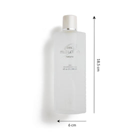 DHC Mild Lotion pouring a drop to demonstrate lightweight hydration