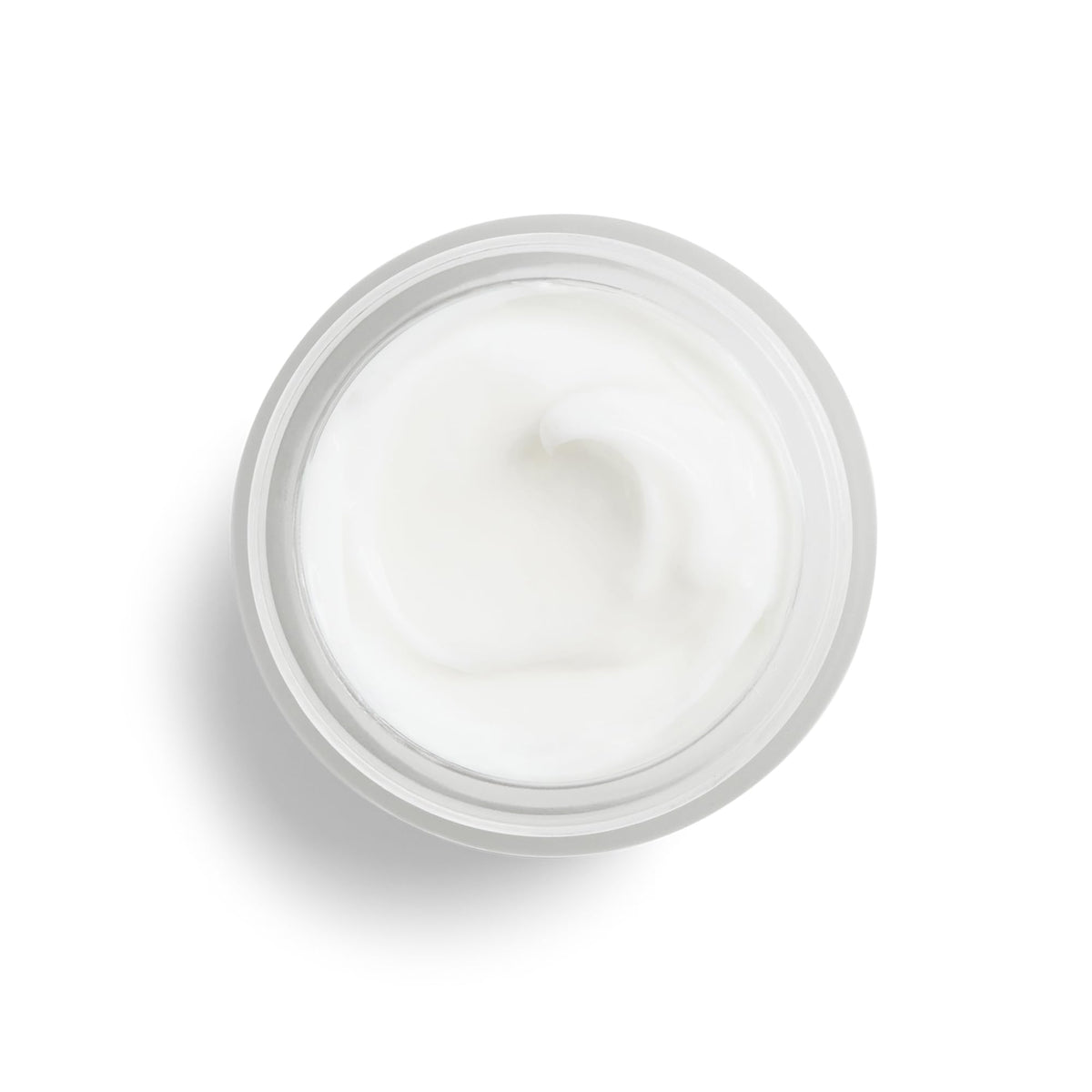 Model applying DHC cream at night illustrating easy evening routine benefit