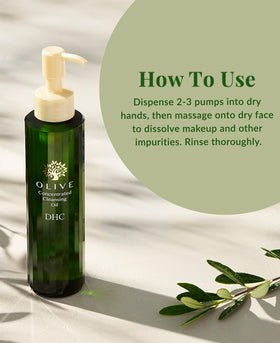 DHC bottle held in hand showing true scale and travel-friendly size