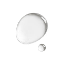 DHC facial oil applied to face and neck for lightweight nourishment