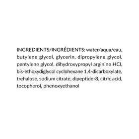DHC bottle on a work desk for quick midday skin refresh