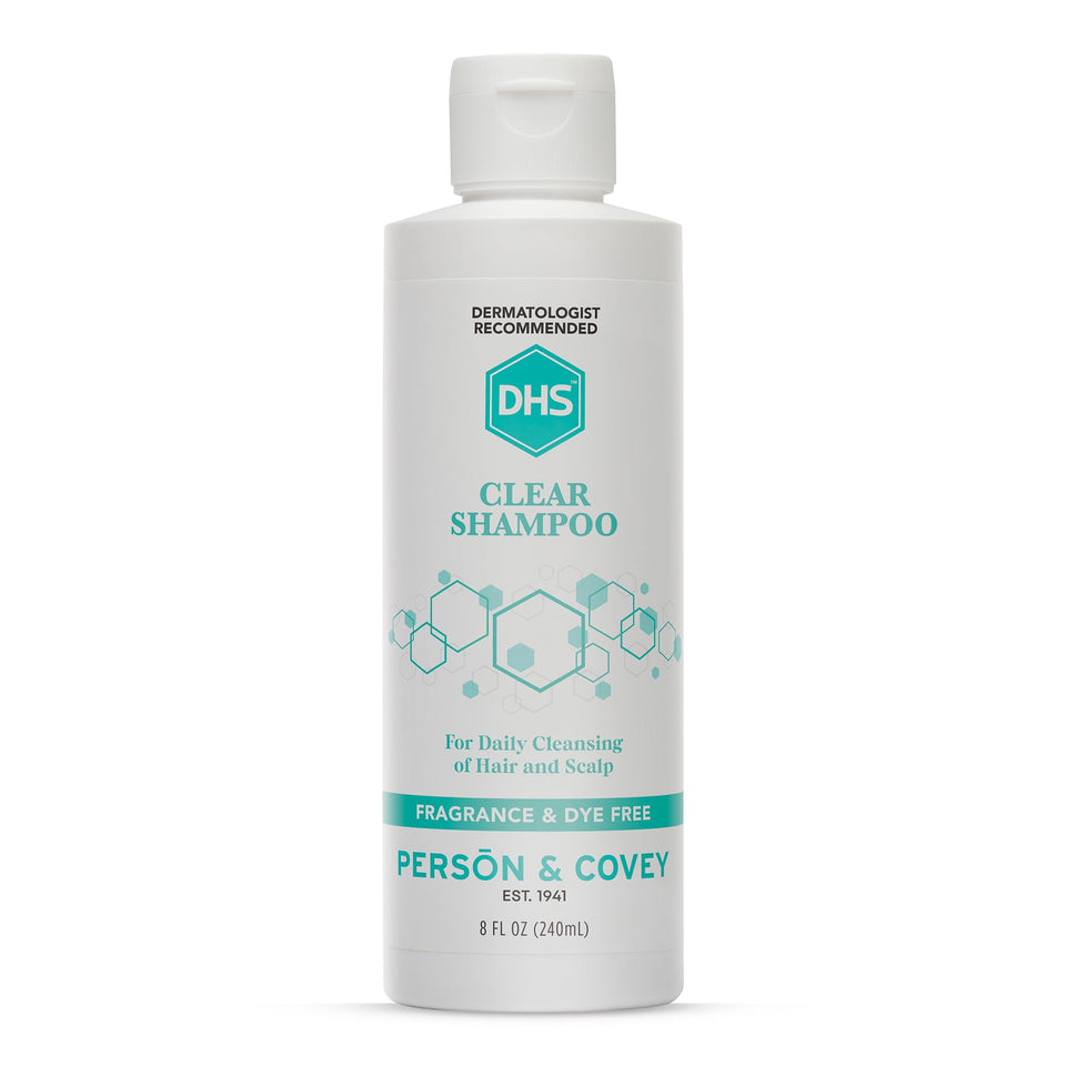 DHS clear shampoo bottle front view showing clean unscented packaging and gentle formula benefit