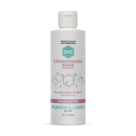 DHS bottle front view showing label and compact 8 oz size for travel-friendly conditioning
