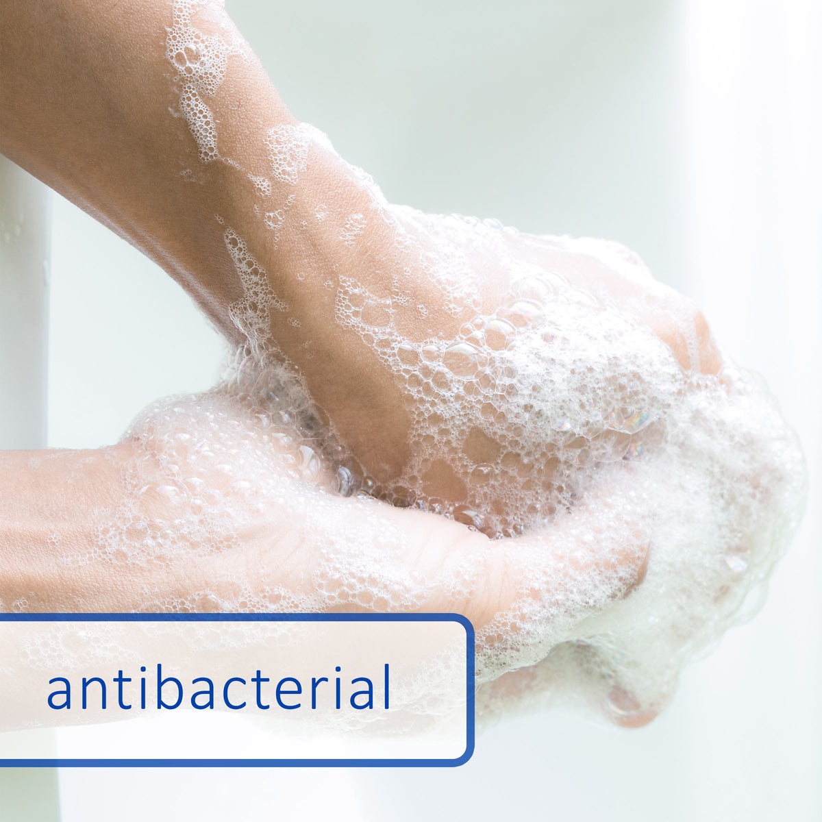 Dial close-up of creamy lather on bar soap highlighting soft texture and gentle cleanse benefit