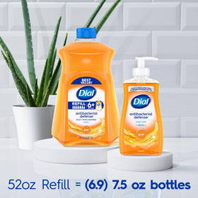 Dial bottle next to a hand and phone illustrating 52 fl oz size and value benefit