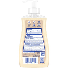 Dial bottle next to hand for size comparison and portable 11-ounce convenience