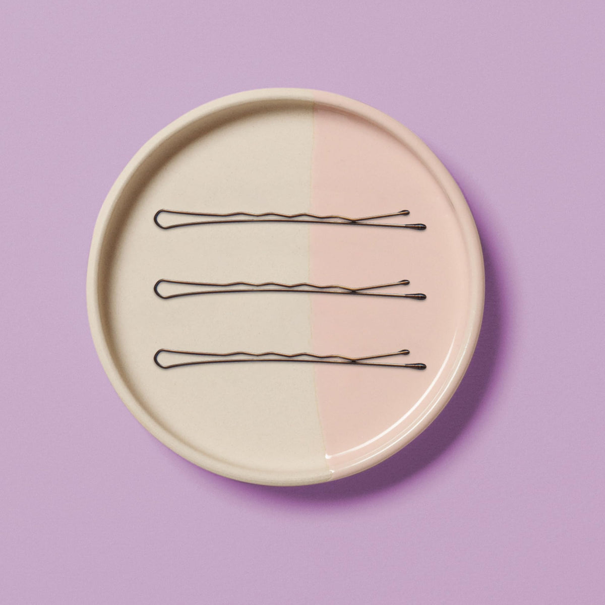 Diane pins beside a ruler showing 2-inch length for deeper anchoring