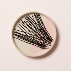 Diane hair pins next to ruler showing 3-inch length and scale