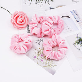 Didder scrunchie worn on wrist for hands-free convenience and style