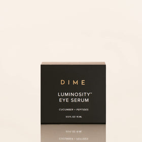 DIME serum held in hand to show scale and travel-friendly size benefit