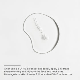 Hand applying DIME TBT Serum to skin demonstrating easy spreading and quick absorption