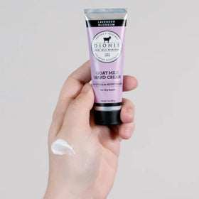 Dionis cream texture close-up revealing smooth goat milk formula for quick absorption