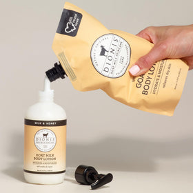 Close-up lotion texture of Dionis milk and honey showing lightweight absorption benefit