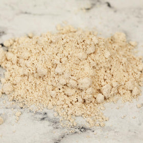 Small bowl of Dirty Treasures mixed into mask for DIY skincare soothe and soften benefit