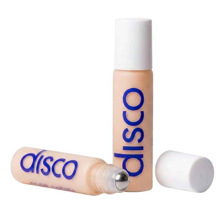 Disco under eye roller front packaging showing compact travel-ready stick