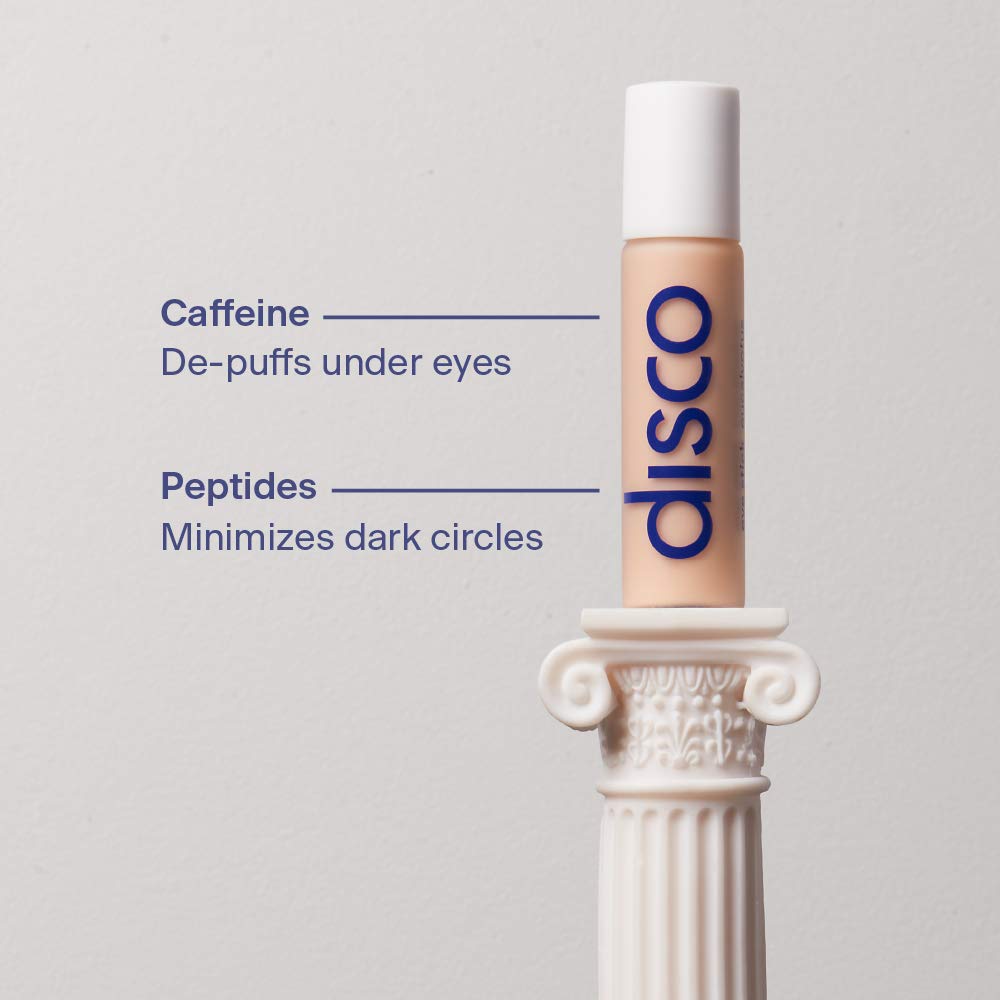 Disco stick held in hand showing 10mL compact size and portability