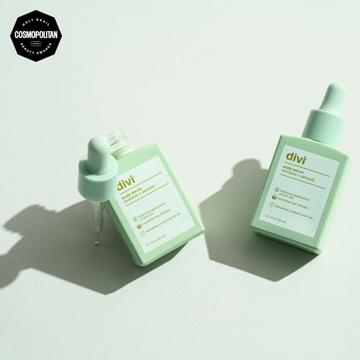 divi scalp serum dropper close-up dispensing clear serum for precise application