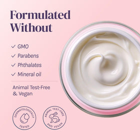 Divine Derriere size comparison beside hand showing compact travel-friendly 50ml