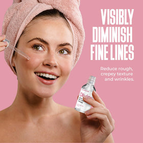 Divine Derriere texture drop on fingertip showing lightweight liquid for quick absorption benefit