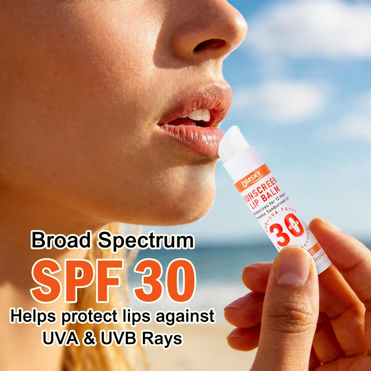 Dmsky lip balm being applied at the beach for SPF lip protection