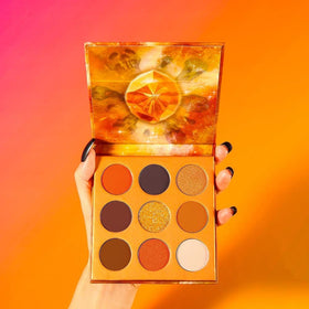 docolor arm swatches comparing warm orange pigments and finishes