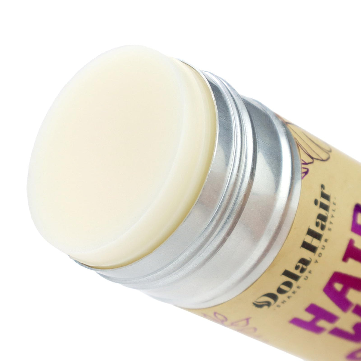 Product label on Dolahair stick displaying safe ingredients and usage info