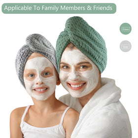 Dolwis towel held by hand showing 10x27 inch size for full hair coverage