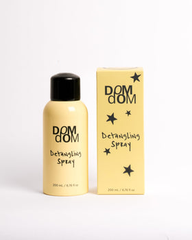Dom Dom front packaging showing bottle and label, clear product view and brand benefit