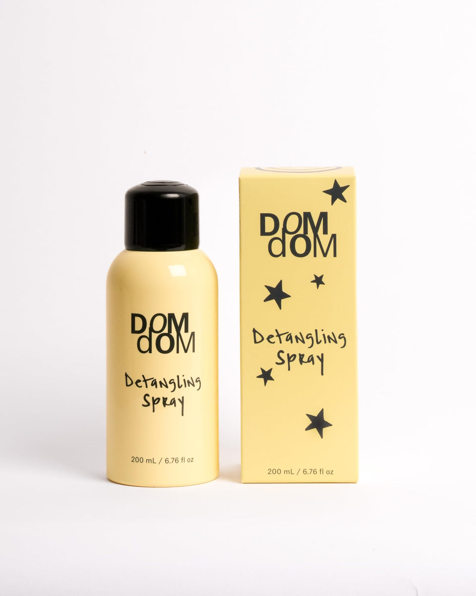Dom Dom front packaging showing bottle and label, clear product view and brand benefit