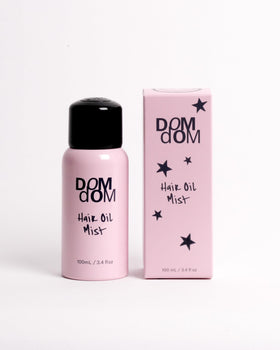Dom Dom front packaging showing bottle and label for quick product ID and benefits