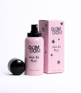 Dom Dom spray texture closeup fine mist delivering lightweight hydration and shine