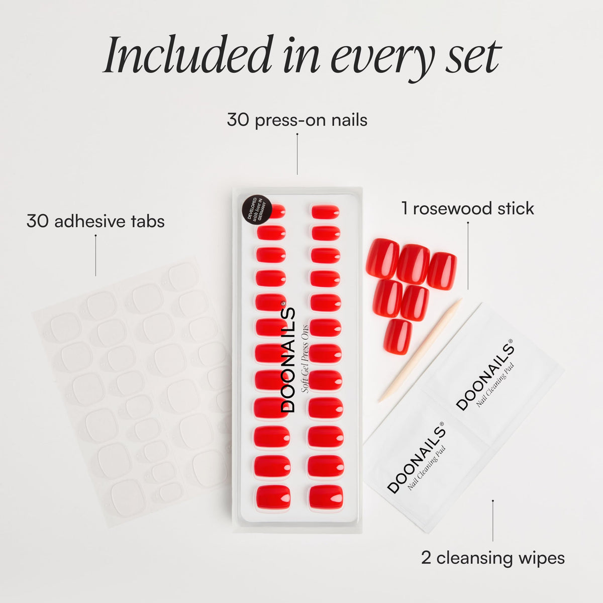 DOONAILS adhesive stickers and cleansing wipes laid out for fast application