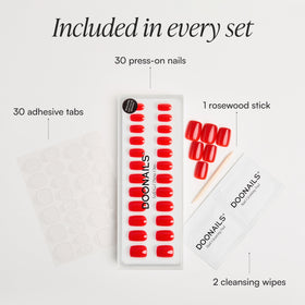 DOONAILS adhesive stickers and cleansing wipes laid out for fast application