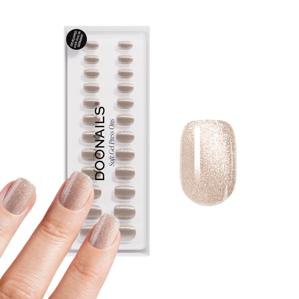 DOONAILS front packaging showing champagne metallic finish and benefits