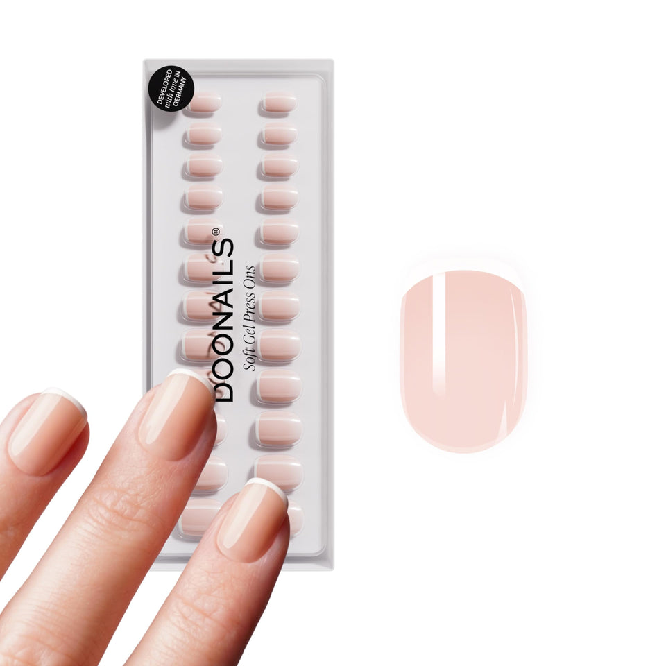 DOONAILS front packaging showing white French tips and benefits