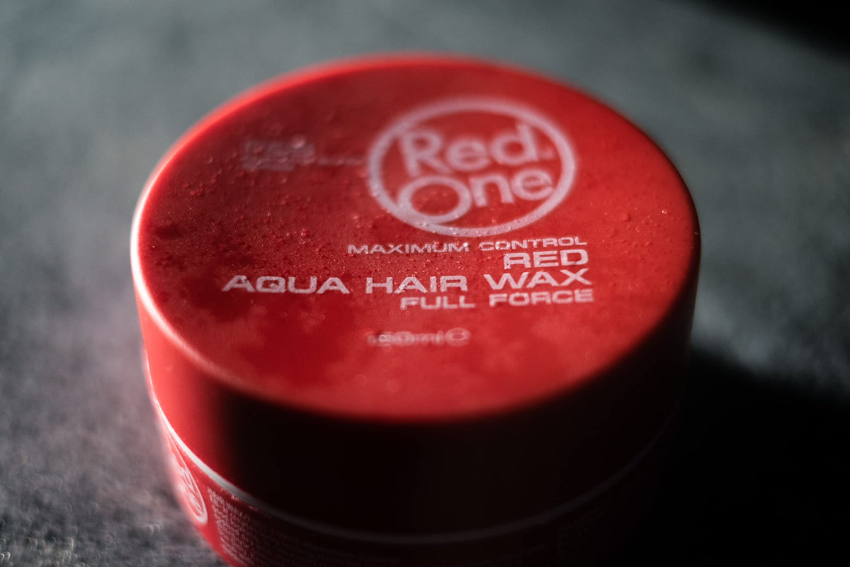 Dorzu Red One styled pompadour sideview displaying glossy hold and sculpted shape