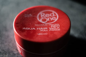 Dorzu Red One styled pompadour sideview displaying glossy hold and sculpted shape